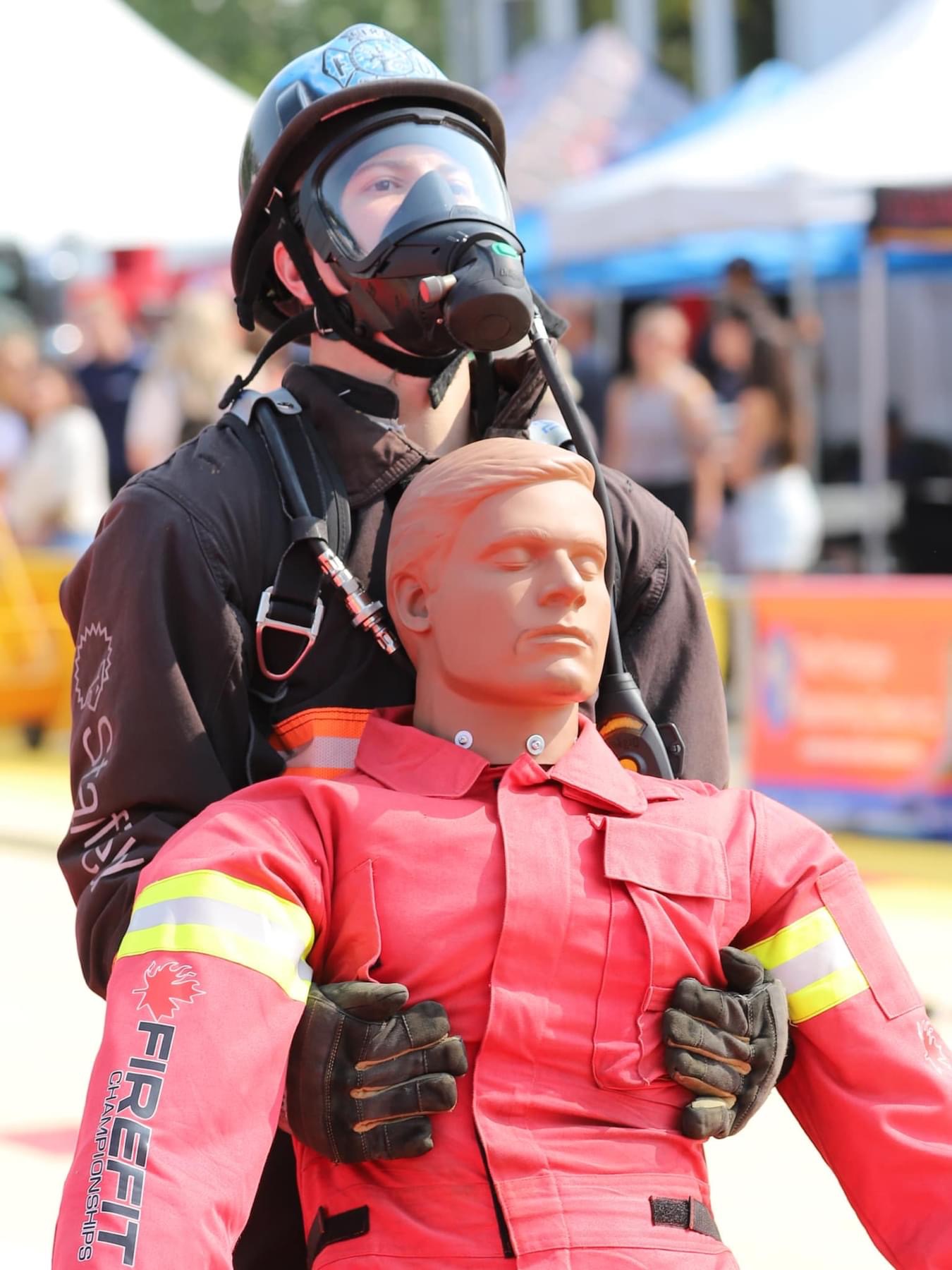 Firefighter performing victim rescue drag at FireFit Championships